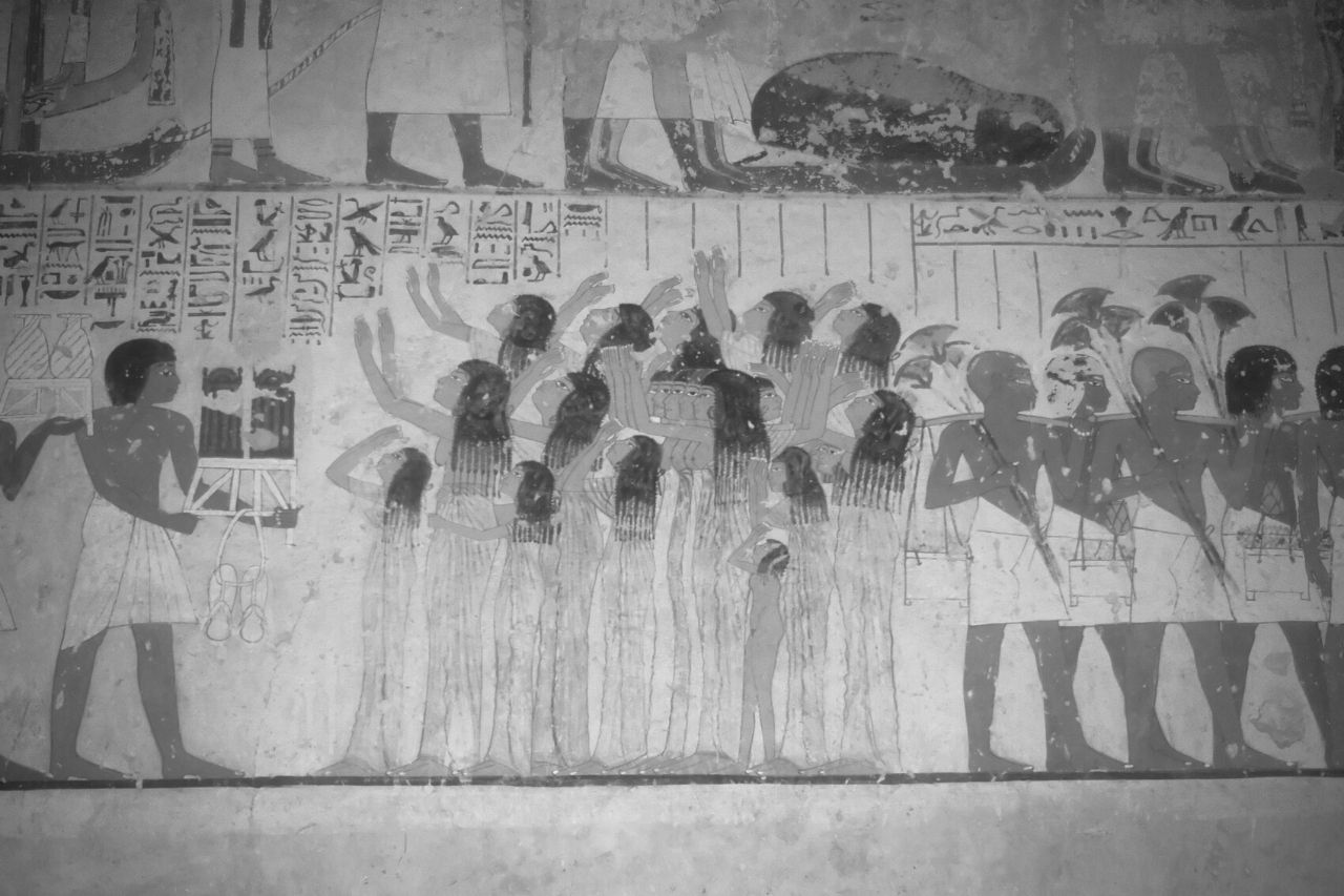 Peinture d'une procession funéraire dans une tombe de l'Égypte antique